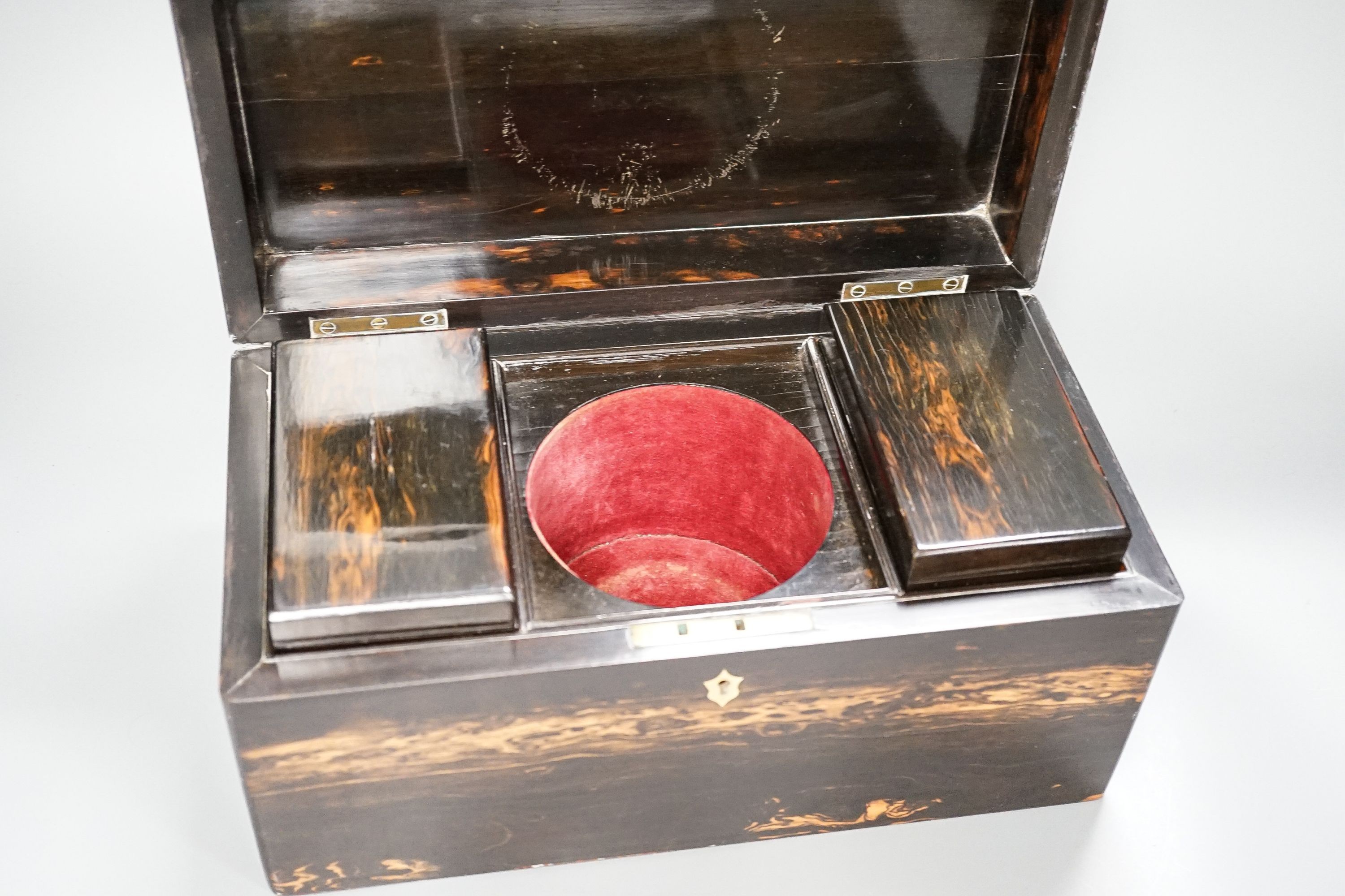 A Victorian coromandel wood tea caddy (lacking mixing bowl), height 17cm